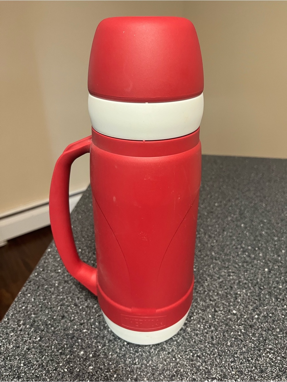 Vintage red Thermos brand hot/cold insulated Add-a-cup thermos